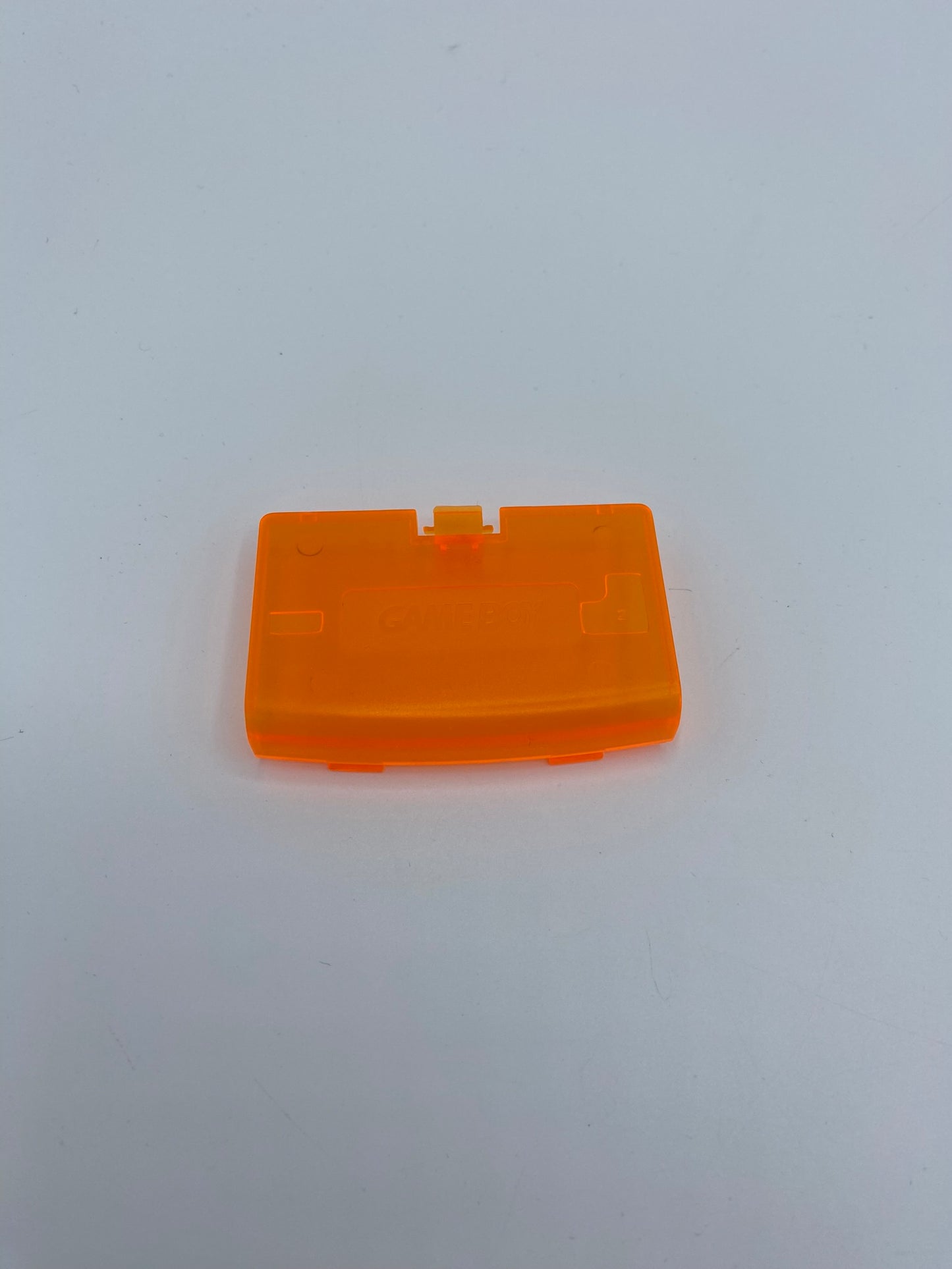 Batteriedeckel GBA Orange Transparent